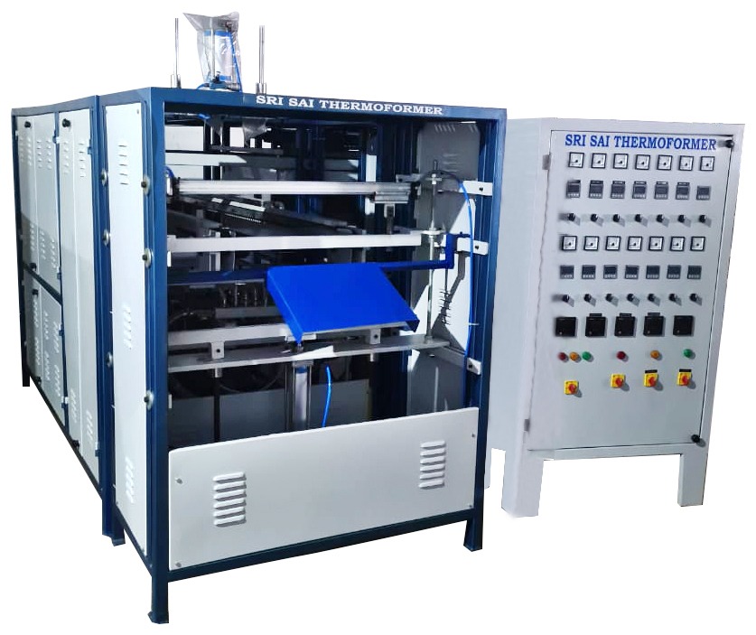 AUTOMATIC  VACUUM FORMING MACHINE WITH SHEAR CUTTER
